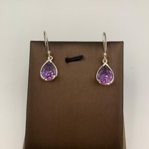 Sterling Silver Jewelry Care Guide To maintain the brilliant sparkle of your 925 Sterling Silver and Austrian Crystals, follow these simple steps to ensure they remain as beautiful as the day you received them. 1. Wear with Care The "Last On, First Off" Rule: Always put your earrings on after applying makeup, perfume, hairspray, or lotions. Chemicals in these products can accelerate tarnishing and dull the surface of the crystals. Avoid Moisture: Remove your jewelry before swimming, showering, or exercising. Chlorine and salt water are particularly harsh on sterling silver. 2. Proper Cleaning Soft Cloth Only: Use a lint-free, 100% cotton cloth or a specialized silver polishing cloth to gently wipe away oils and fingerprints. Avoid Abrasives: Never use paper towels or tissues, as their fibers can leave tiny scratches on the polished silver or the crystal facets. Mild Soap: If needed, use a drop of phosphate-free dish soap in warm water. Pat dry thoroughly with a soft towel immediately—never leave silver to air-dry. 3. Safe Storage Airtight is Best: When not in use, store your earrings in a small airtight bag or a lined jewelry box. Exposure to air and humidity is what causes silver to oxidize (tarnish). Keep Separate: Store them individually to prevent the metal or crystals from scratching against other pieces of jewelry. Pro Tip: Wearing your sterling silver frequently actually helps prevent tarnish! The natural oils from your skin can help keep the metal clean and shiny.